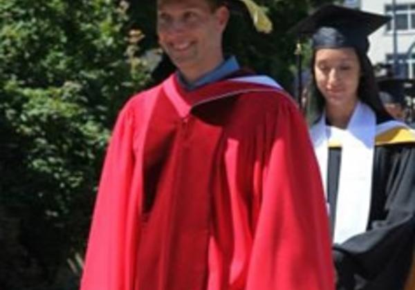 Graduate in a red gown