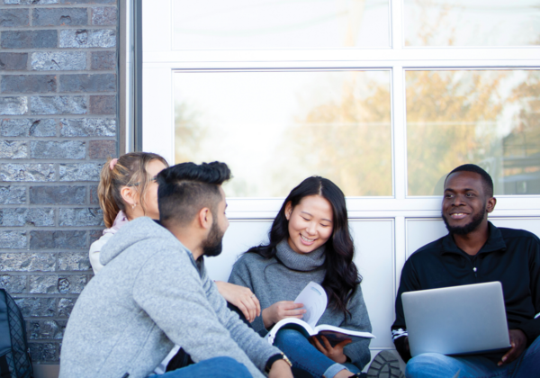 students connecting while seated