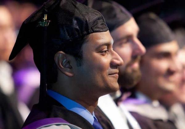 Students at a graduation ceremony.