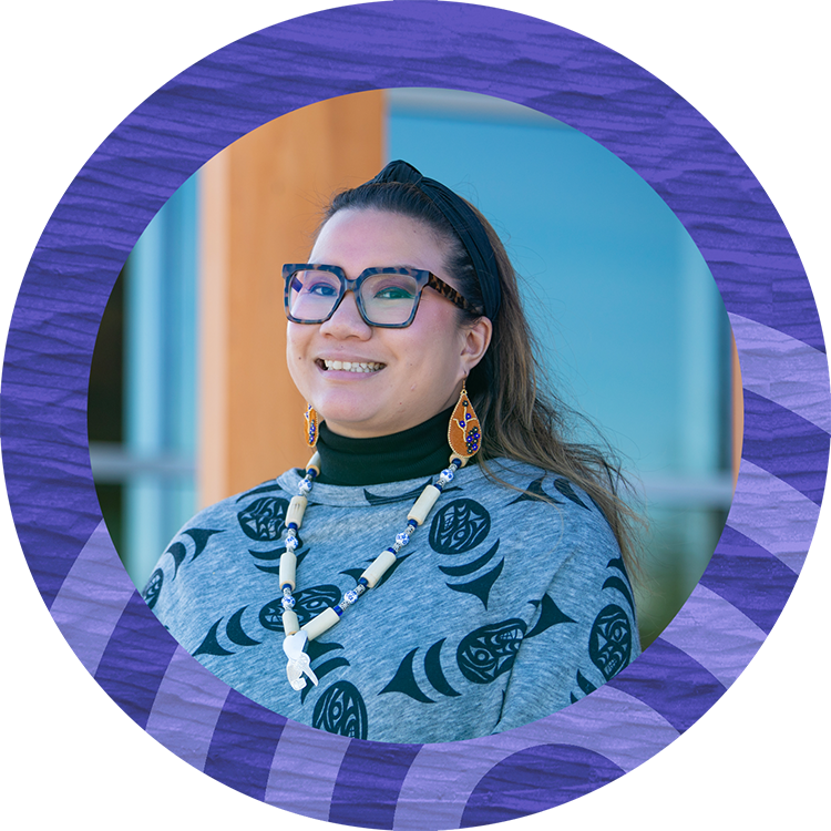 Leah stands in front of gathering place