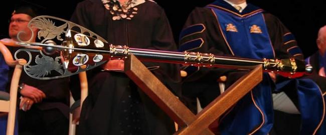 An ornately decorated mace. 