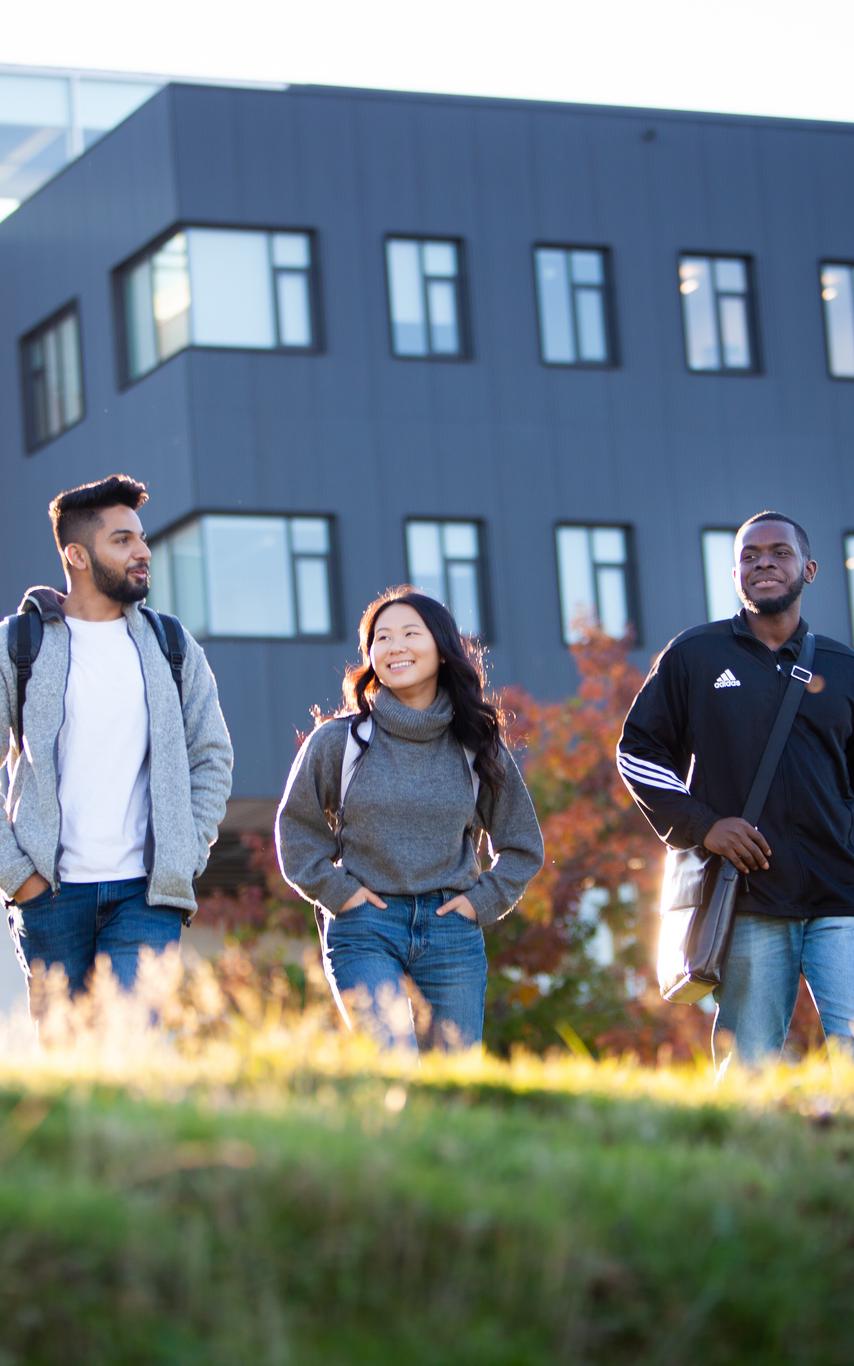 3 students walking outside on VIU Nanaimo Campus